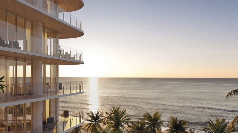 Ocean House, Surfside, oceanfront condo at sunset, boutique building on the sand; luxury and ultra luxury condos, prime resale. Featuring modern.