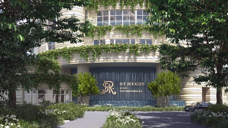 St. Regis Brickell luxury residences in Miami featuring elegant architecture, lush landscaping, and exclusive entrance design. Featuring exterior.