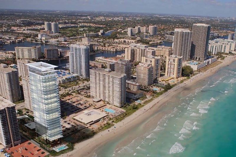 Aerial coastal view of 2000 Ocean in Hallandale Beach with oceanfront skyline, beach and Intracoastal waterways, showcasing luxury and ultra luxury resale condos in South Florida.