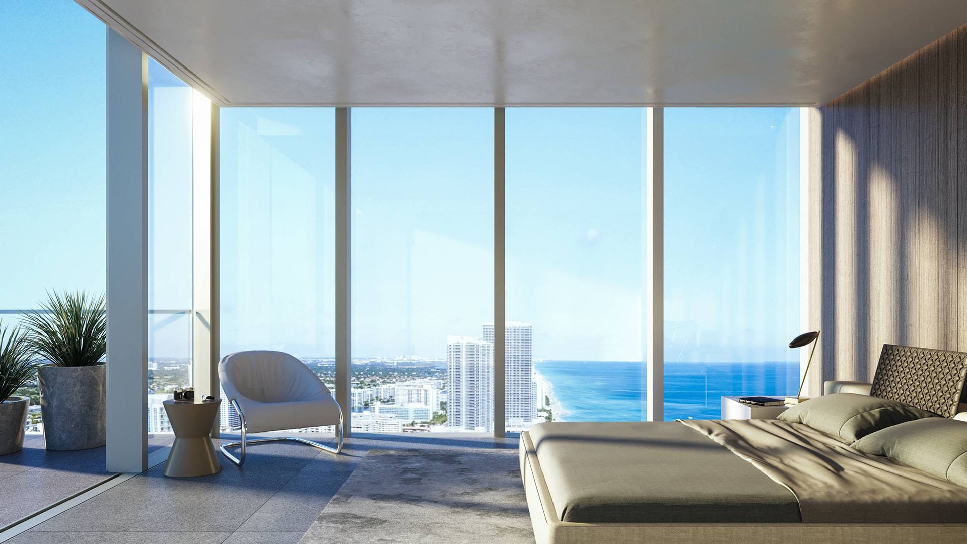 2000 Ocean Hallandale Beach bedroom with floor-to-ceiling glass and panoramic Atlantic ocean view, showcasing luxury and ultra luxury resale condos interiors in South Florida.
