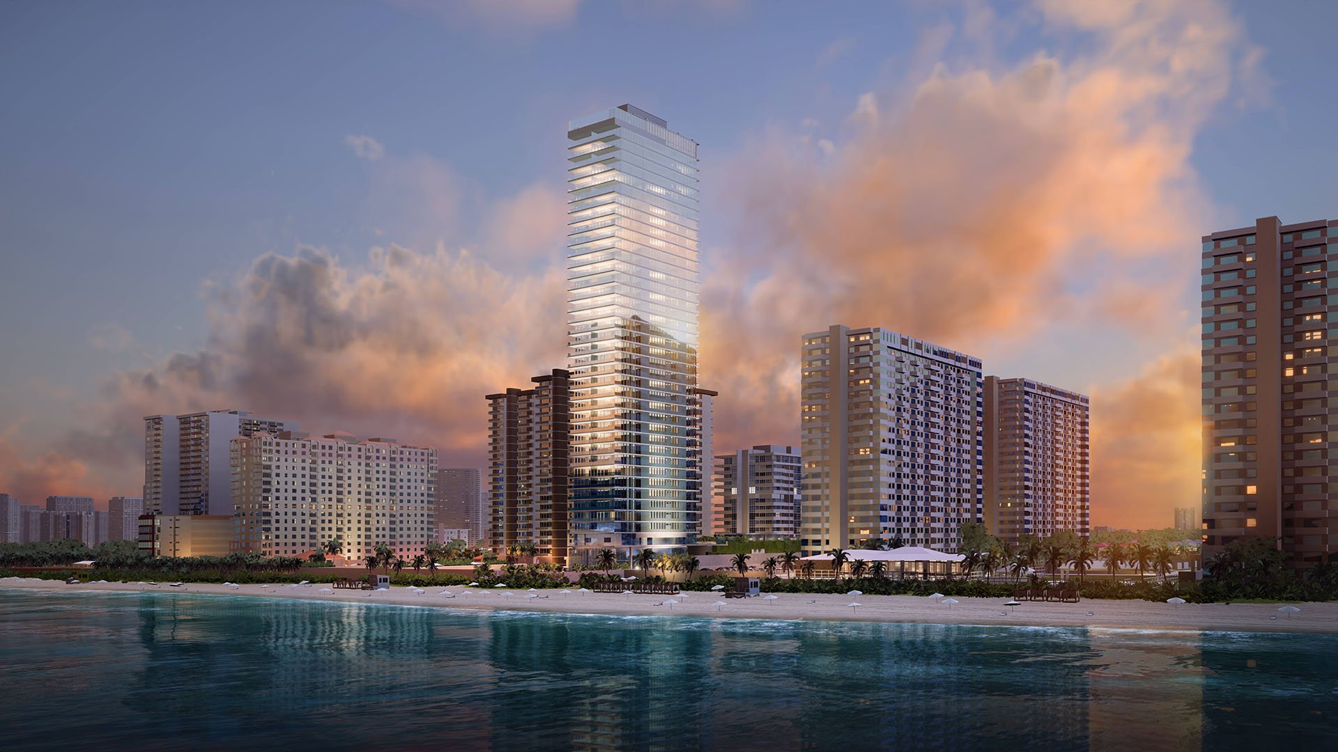 2000 Ocean Hallandale Beach oceanfront tower at sunset reflected on the Atlantic, showcasing luxury and ultra luxury resale condos on South Florida's coastline.