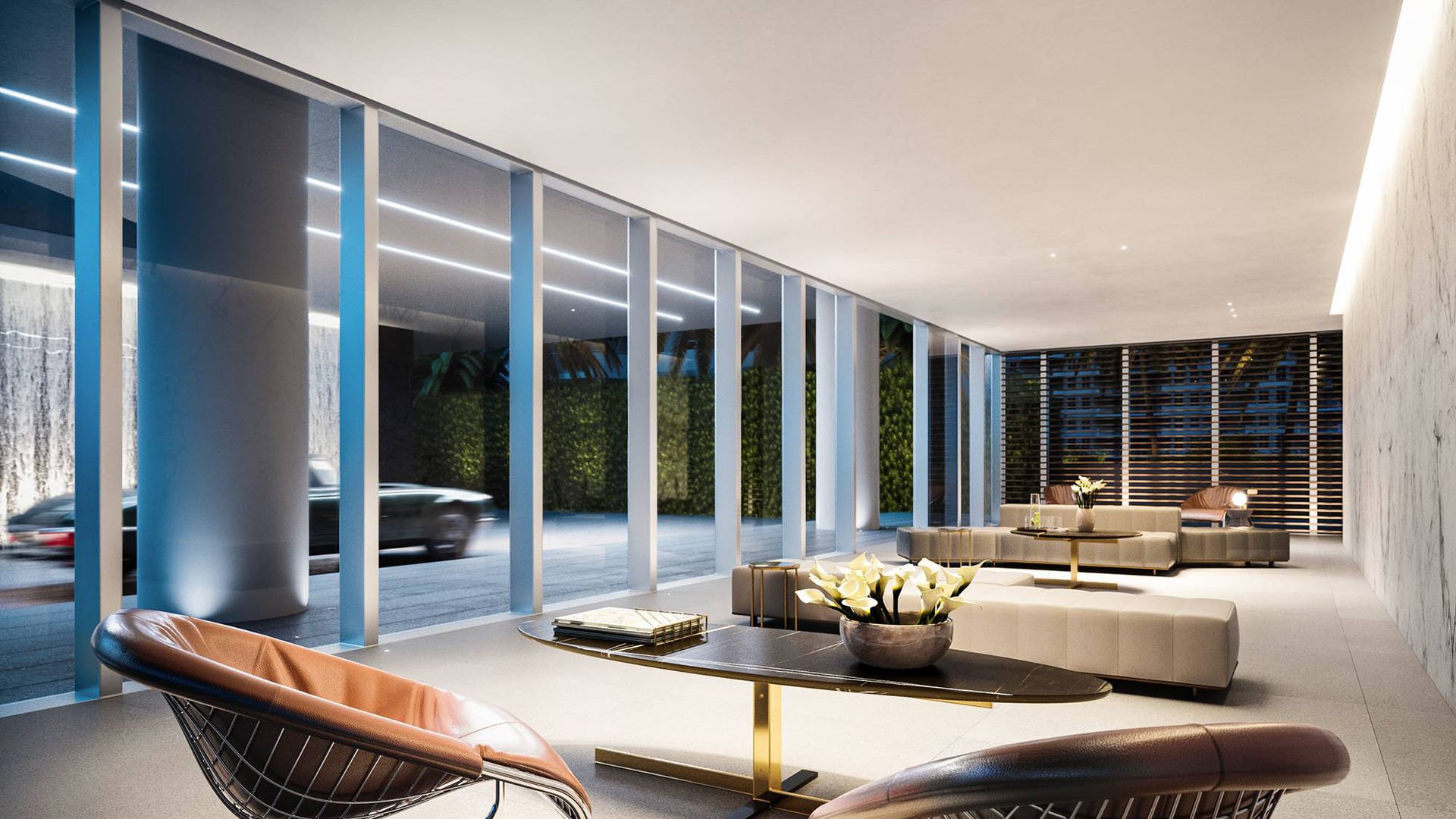2000 Ocean residents' lobby with floor-to-ceiling glass, curated lounge seating and contemporary lighting in Hallandale Beach, South Florida, setting the tone for luxury and ultra luxury preconstruction condos and amenities.