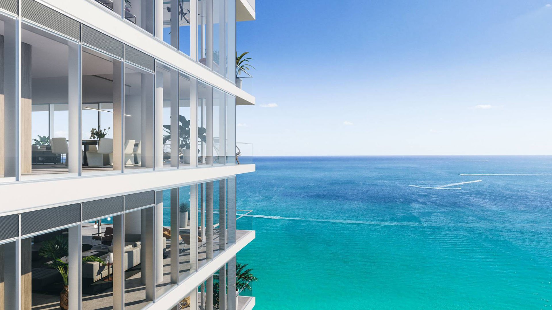 2000 Ocean modern glass tower with expansive balconies and sweeping Atlantic Ocean views in Hallandale Beach, South Florida, showcasing luxury and ultra luxury preconstruction condos on the beachfront.