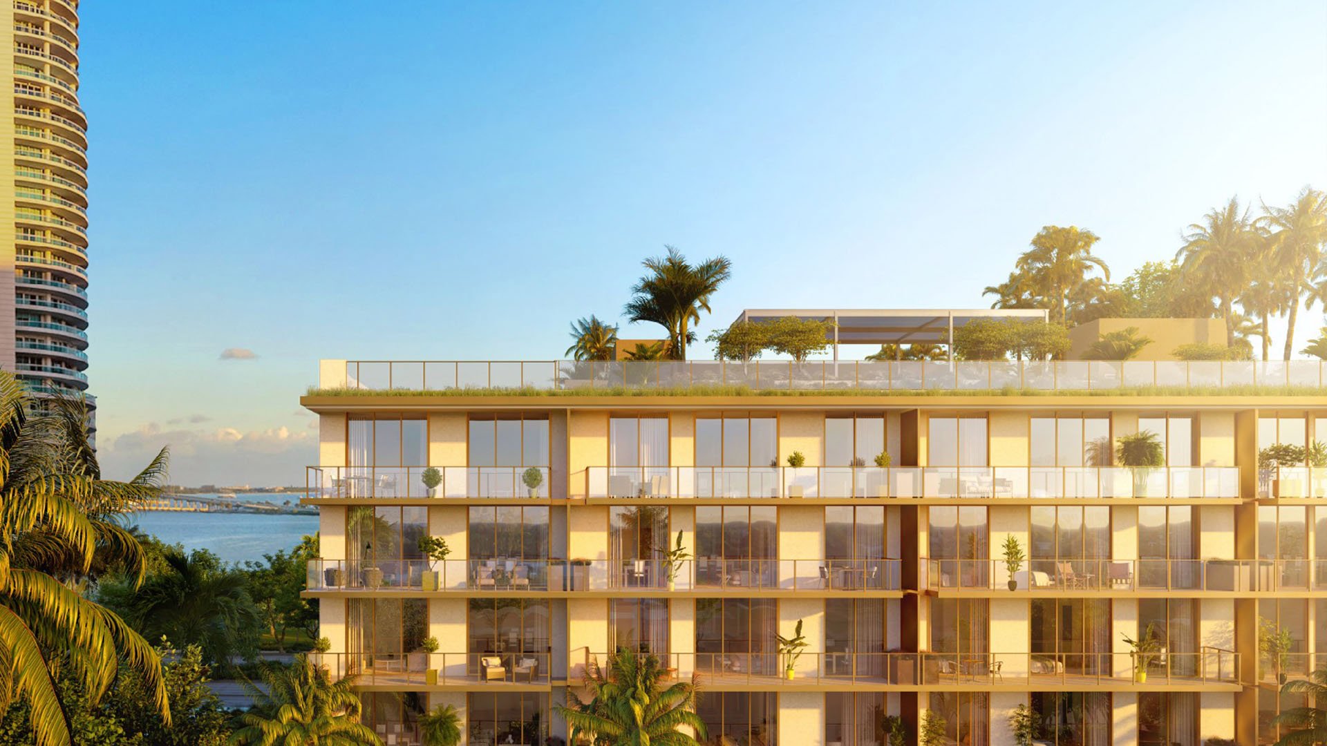 2200 Brickell waterfront facade with rooftop terrace and Biscayne Bay views, showcasing luxury and ultra luxury preconstruction condos in Brickell, Miami, Florida.
