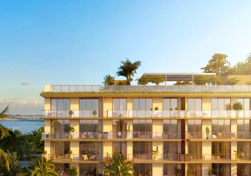 2200 Brickell waterfront facade with rooftop terrace and Biscayne Bay views, showcasing luxury and ultra luxury preconstruction condos in Brickell, Miami, Florida.