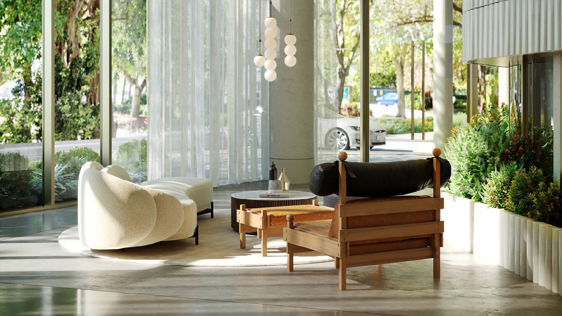 2200 Brickell, Brickell Miami, Florida lounge with curved sofa, statement chairs, hanging globes and garden views through tall glass, featuring luxury and ultra luxury preconstruction condos amenity spaces.
