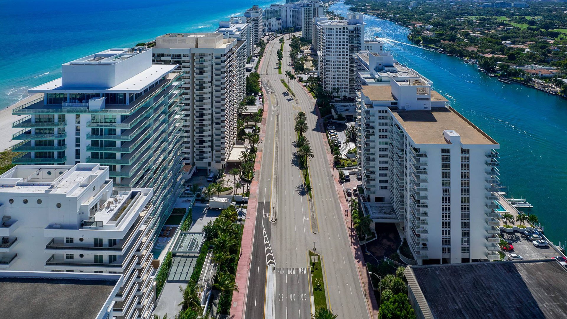 57 Ocean Miami Beach aerial coastal cityscape with Atlantic shoreline, showcasing luxury and ultra luxury preconstruction condos in Mid-Beach on Millionaire's Row, Miami Beach, Florida.