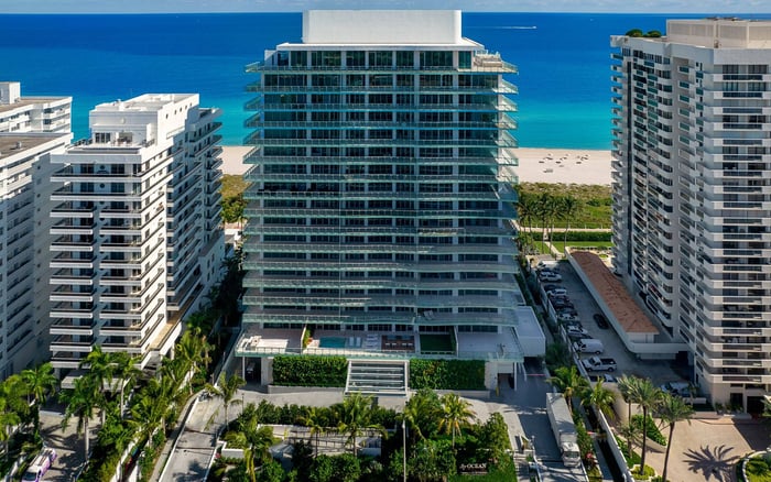 Comparing the Aesthetics of Raw Concrete vs. Polished Plaster: 57 Ocean Miami Beach vs. Arte Surfside