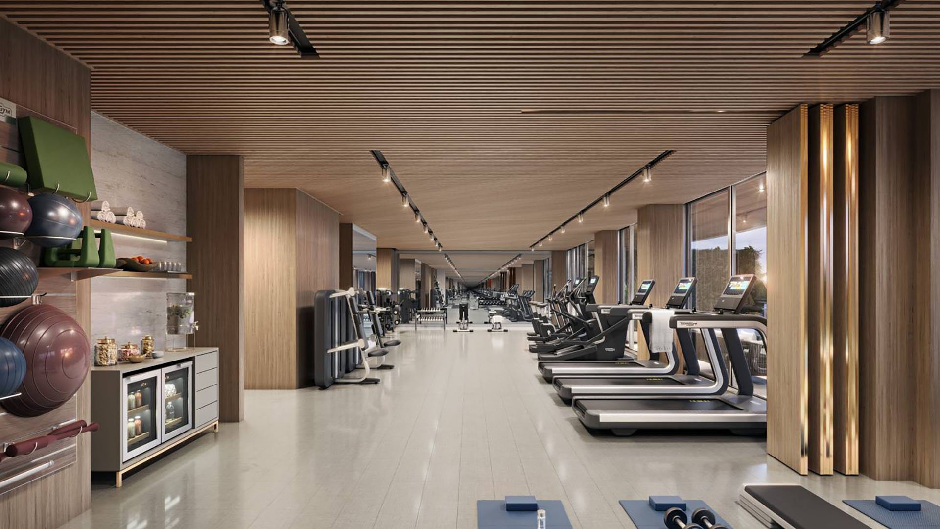 57 Ocean Miami Beach modern gym interior with premium equipment, showcasing luxury and ultra luxury preconstruction condos wellness amenities in Mid-Beach, Miami Beach, Florida.