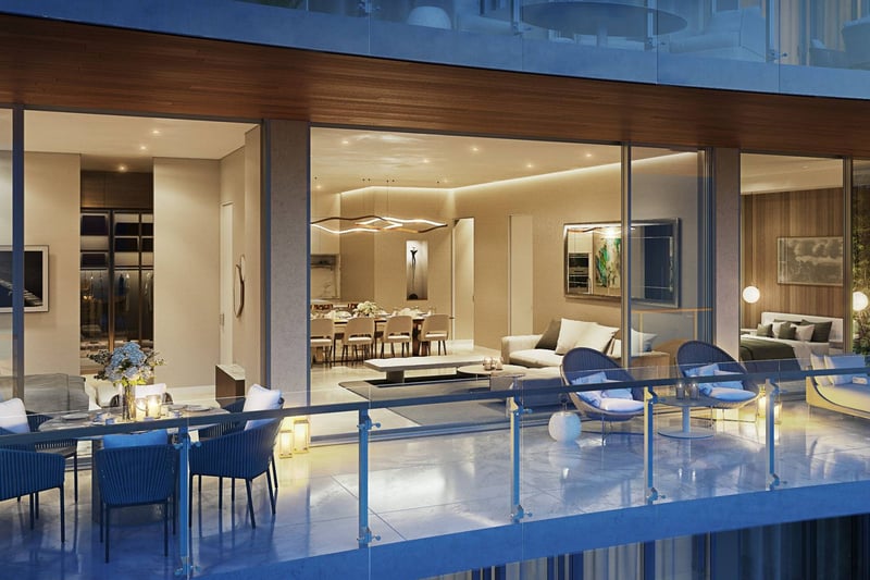 57 Ocean Miami Beach modern living room with balcony seating setup, showcasing luxury and ultra luxury preconstruction condos interiors in Mid-Beach, Miami Beach, Florida.