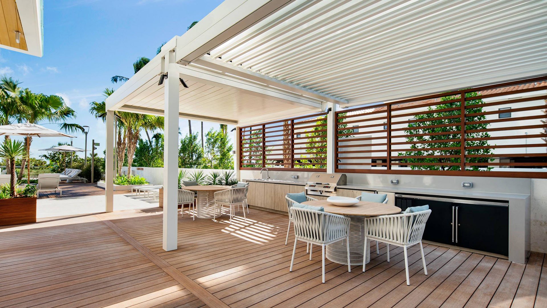 57 Ocean Miami Beach outdoor kitchen patio design for entertaining, showcasing luxury and ultra luxury preconstruction condos amenities in Mid-Beach, Miami Beach, Florida.