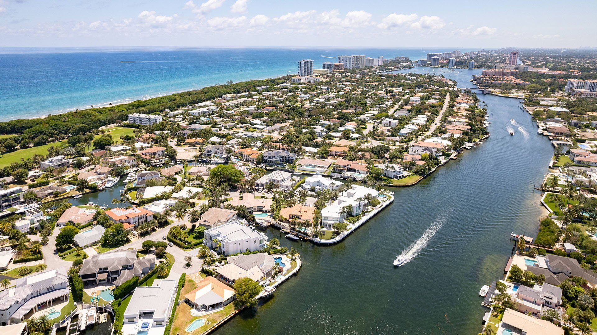 749 Bamboo Dr Boca Raton coastal waterfront aerial view of canals and shoreline, showcasing luxury and ultra luxury resale real estate near Boca Raton condos in Sun and Surf, Florida.