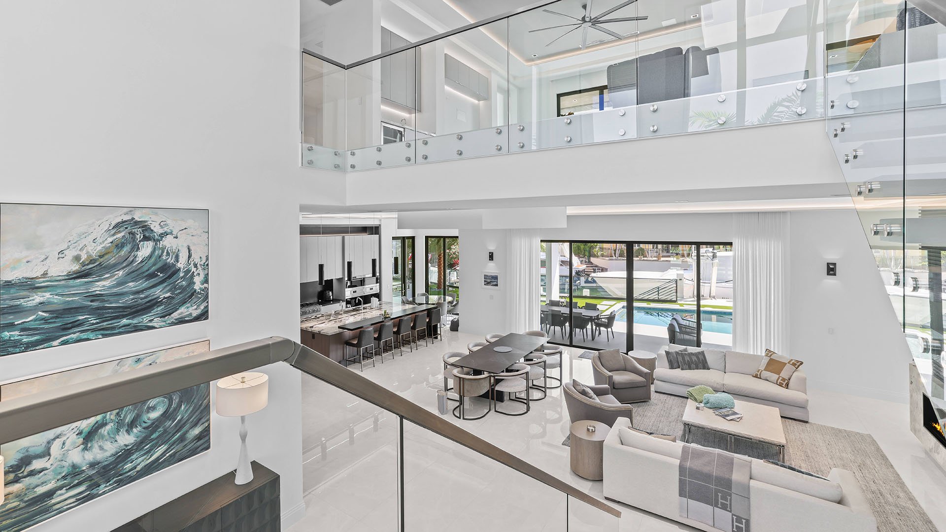 749 Bamboo Dr Boca Raton first-floor living room interior design with seating, showcasing luxury and ultra luxury resale Sun and Surf home beyond condos, Boca Raton, Florida.