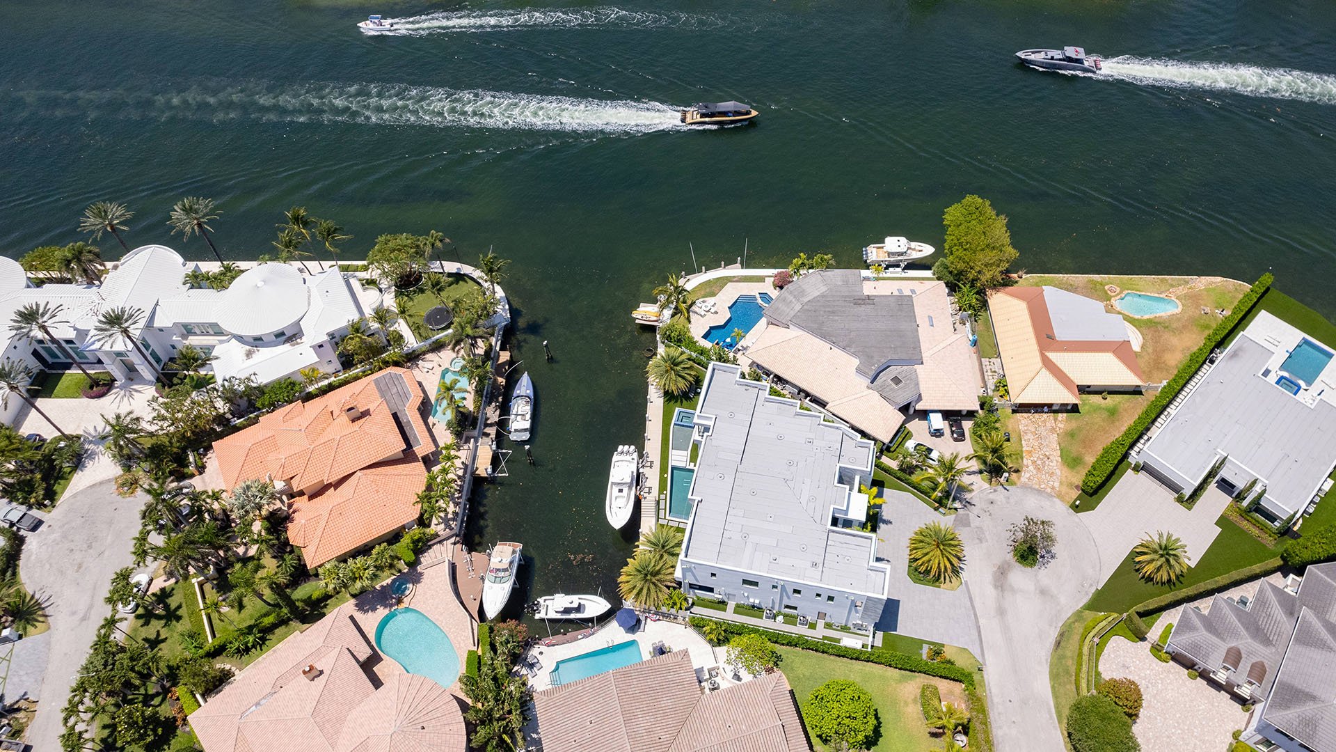749 Bamboo Dr Boca Raton aerial view of waterfront property and canal, showcasing luxury and ultra luxury resale Sun and Surf estate living near Boca Raton condos, Boca Raton, Florida.