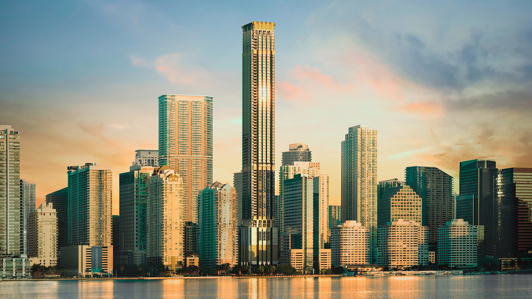 888 Brickell Residences, Brickell Miami skyline at sunset, striking modern tower by Biscayne Bay; luxury and ultra luxury condos with prime preconstruction in the financial district. Featuring cityscape and architecture.