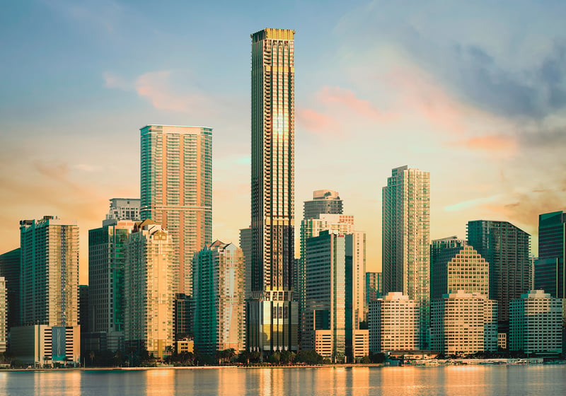 888 Brickell Residences, Brickell Miami skyline at sunset, striking modern tower by Biscayne Bay; luxury and ultra luxury condos with prime preconstruction in the financial district. Featuring cityscape and architecture.