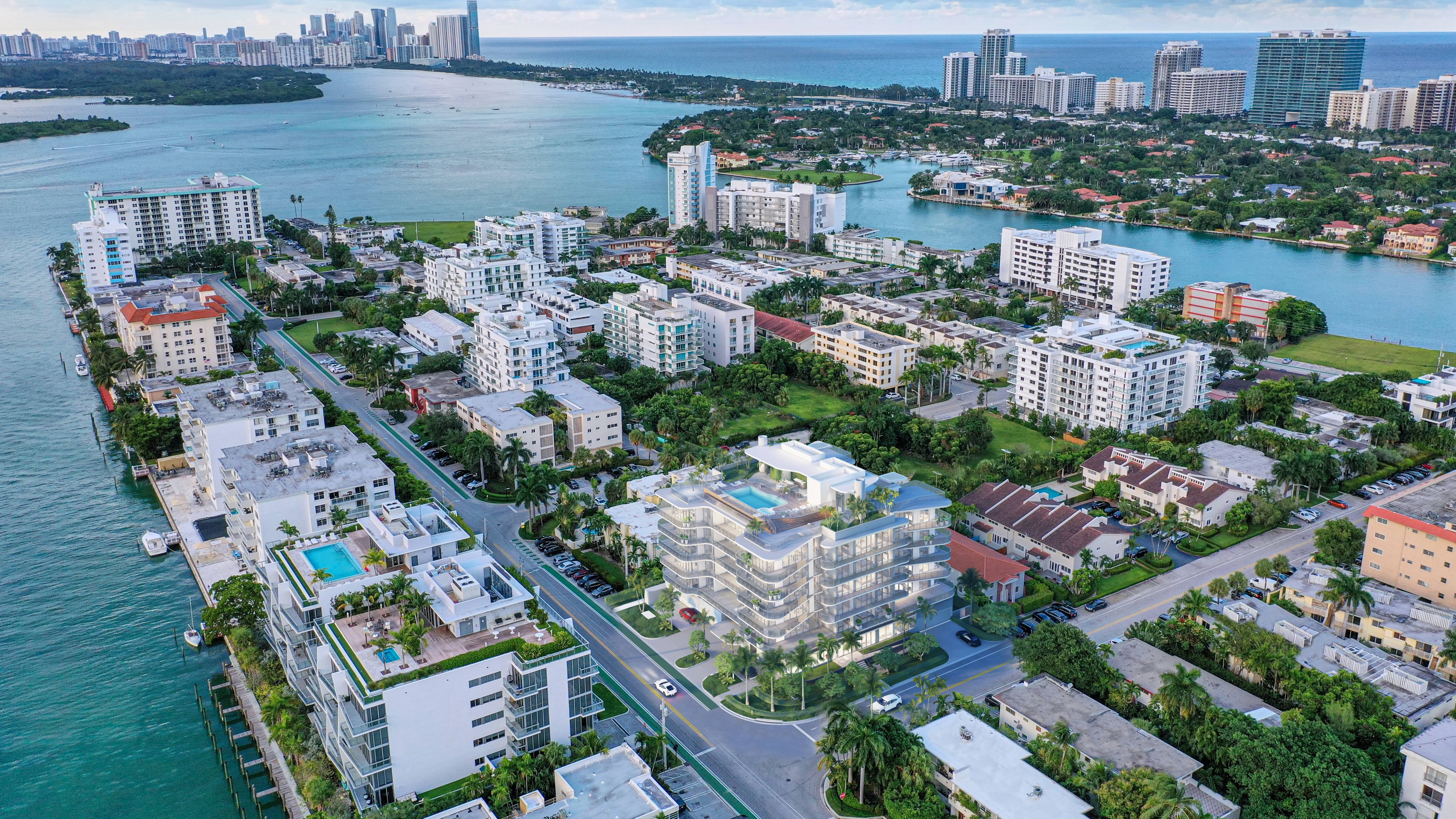 Alana Bay Harbor Islands aerial waterfront view in Miami, showcasing luxury and ultra luxury preconstruction condos near the bay.