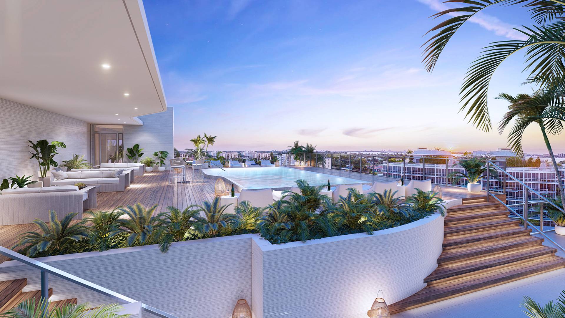 Alana Bay Harbor Islands rooftop pool lounge at sunset, showcasing luxury and ultra luxury preconstruction condos lifestyle.
