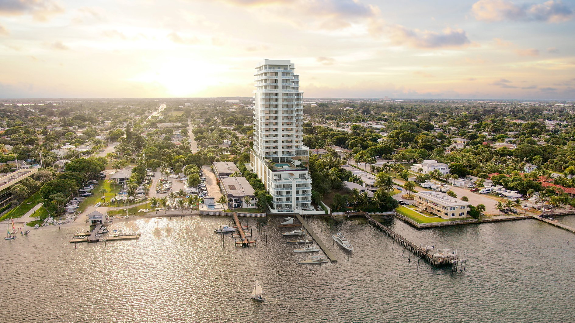 ALBA Palm Beach, West Palm Beach coastal condo at sunset with glowing glass, waterfront luxury and ultra luxury condos; preconstruction. Featuring view.