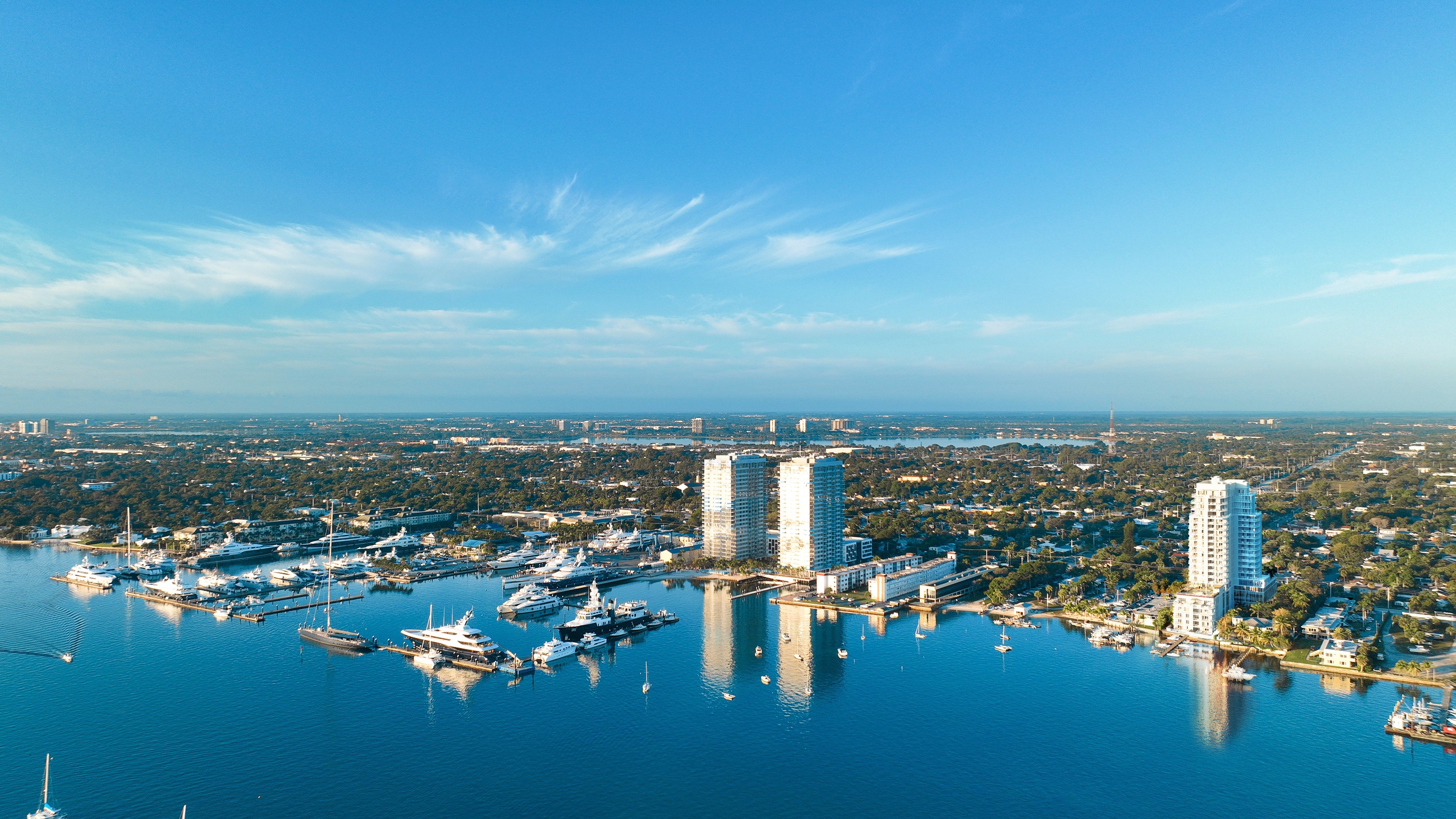ALBA Palm Beach, West Palm Beach marina aerial over the Intracoastal, waterfront tower setting for luxury and ultra luxury condos; boutique preconstruction. Featuring coastal view.
