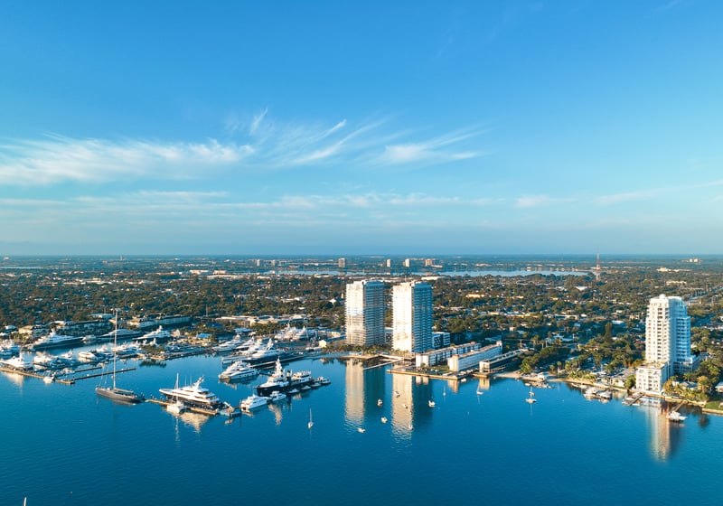 ALBA Palm Beach, West Palm Beach marina aerial over the Intracoastal, waterfront tower setting for luxury and ultra luxury condos; boutique preconstruction. Featuring coastal view.