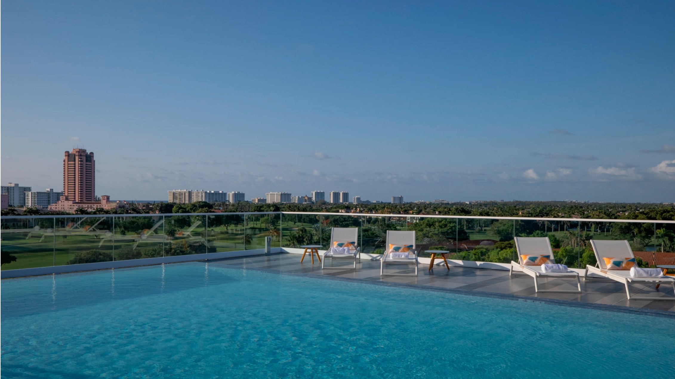 Alina Residences Boca Raton rooftop pool with city views; luxury amenity for ultra luxury resale condos in Boca Raton. Featuring view and cityscape.