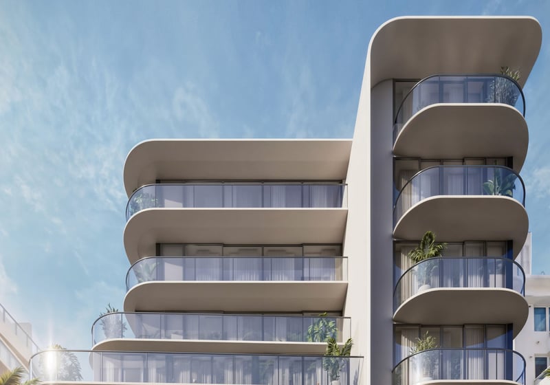Alma Bay Harbor exterior in Bay Harbor Islands, Miami, with a curved facade and wraparound glass balconies, highlighting luxury and ultra luxury preconstruction condos near the waterfront.
