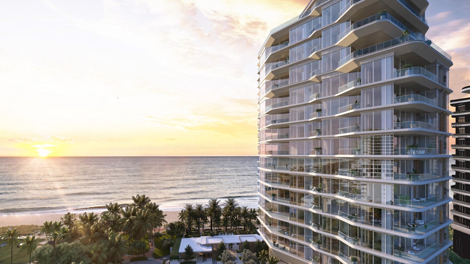 Aman Residences Miami Beach ultra luxury oceanfront highrise condos at sunset, highlighting resort-style preconstruction residences with glowing sky and panoramic waterfront views.