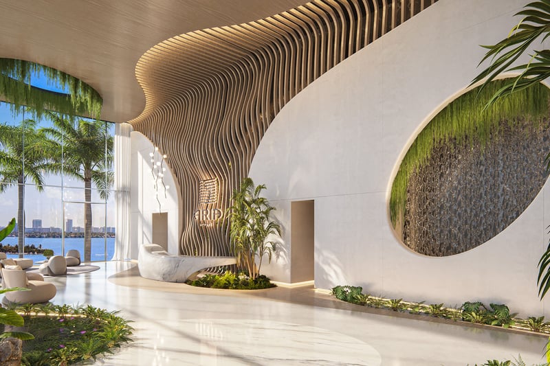 Aria Reserve Edgewater Miami grand lobby with sculptural wood ceiling, curved concierge desk and water feature wall, bay views, showcasing luxury and ultra luxury preconstruction condos arrival experience.