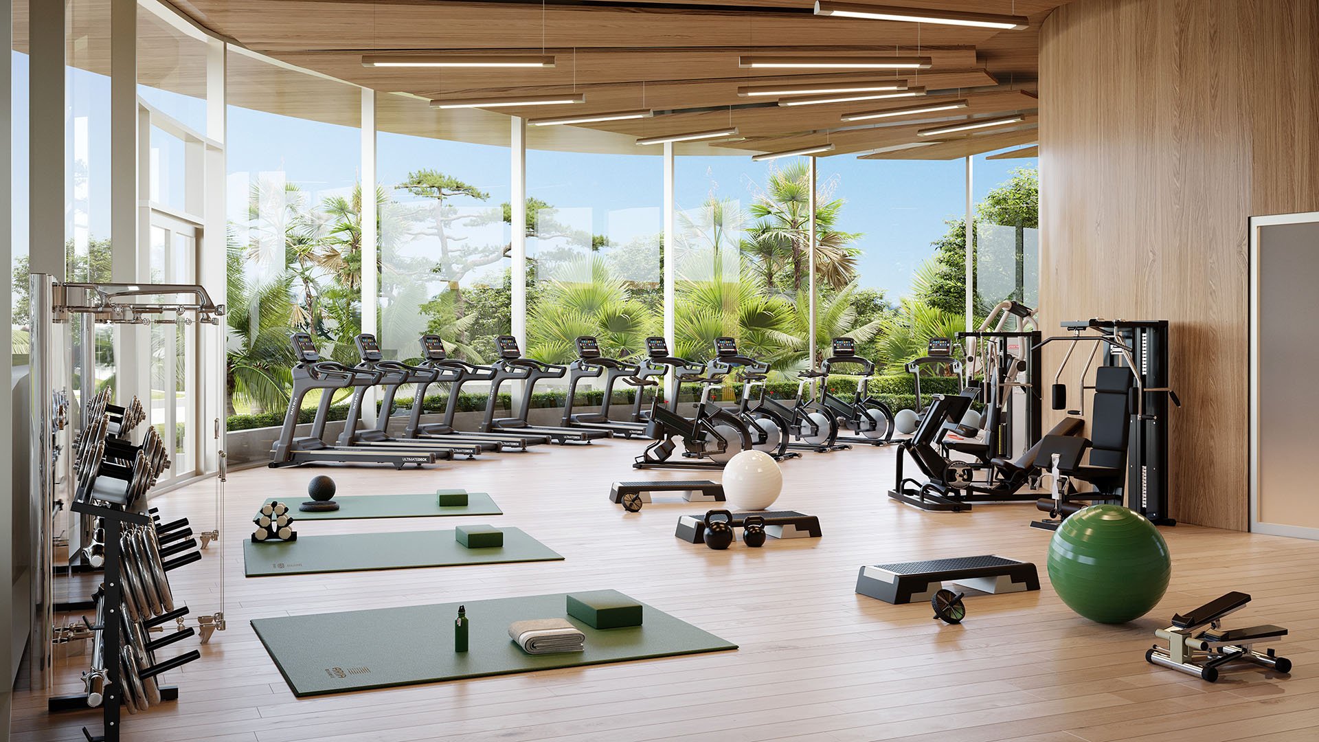 Aria Reserve Edgewater, Miami, Florida fitness center with treadmills, bikes, free weights and yoga mats by panoramic windows and tropical views, highlighting luxury and ultra luxury preconstruction condos amenities.