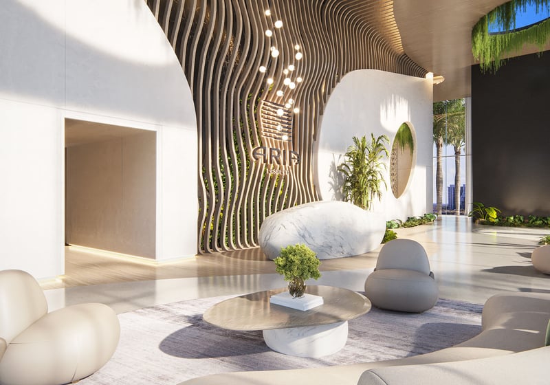 Aria Reserve Edgewater Miami grand lobby with wavy wood feature wall, marble reception desk and lush greenery, setting the arrival experience for luxury and ultra luxury preconstruction condos on Biscayne Bay.