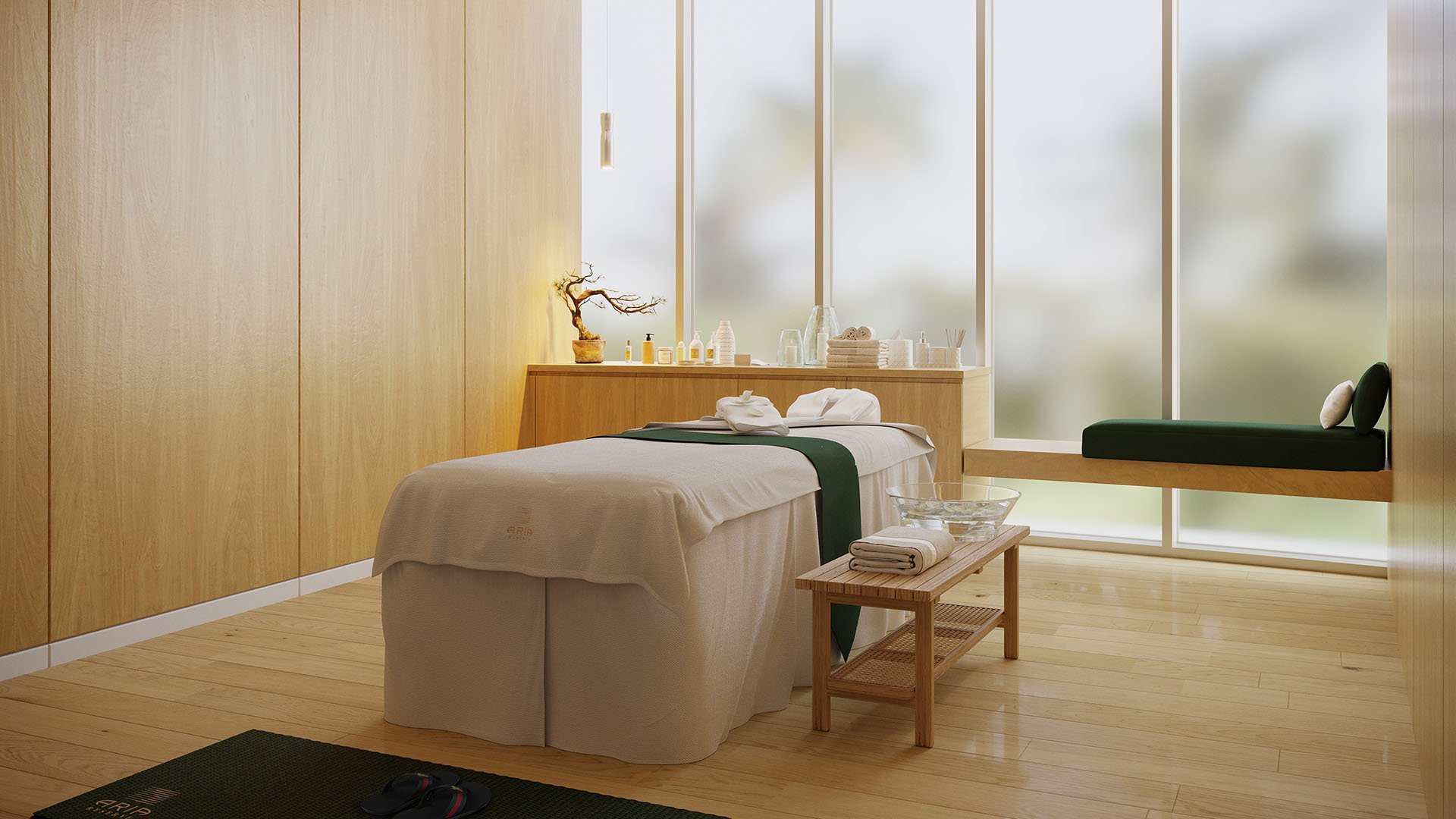 Aria Reserve Edgewater Miami spa treatment room with massage table and floor-to-ceiling windows, highlighting luxury and ultra luxury preconstruction condos with wellness amenities and serene modern design.