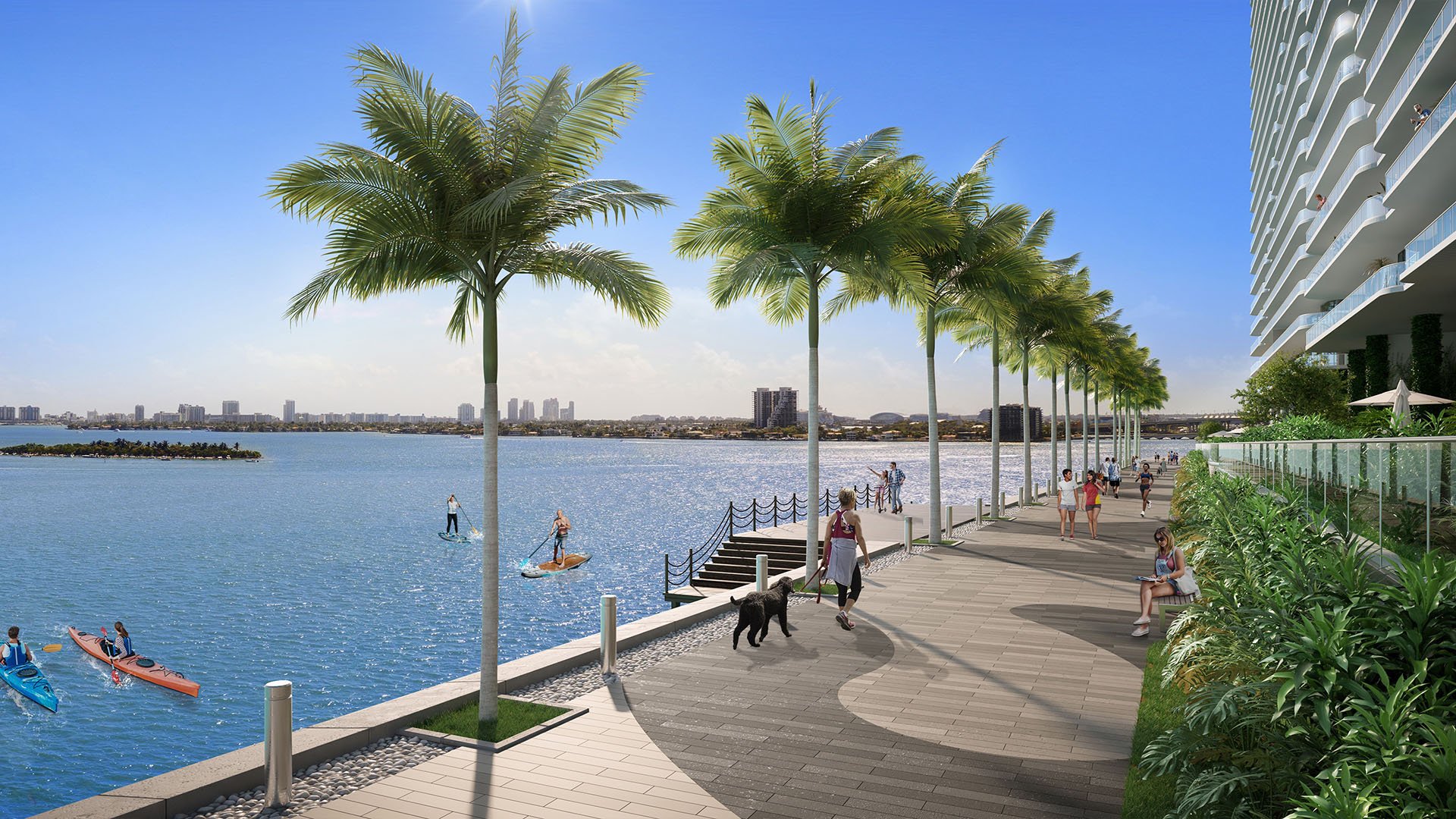 Aria Reserve Edgewater, Miami waterfront promenade with palm-lined baywalk, residents strolling and paddleboarders on Biscayne Bay, representing luxury and ultra luxury preconstruction condos with active outdoor living.