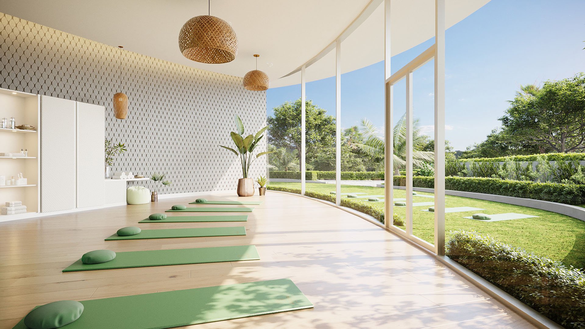 Aria Reserve Edgewater, Miami sunlit yoga studio with floor-to-ceiling glass, mats and meditation cushions, promoting wellness at luxury and ultra luxury preconstruction condos with garden views.