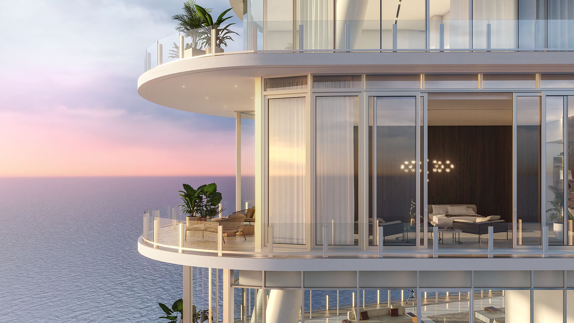 Aston Martin Residences in Downtown Miami luxury and ultra luxury condos curved glass corner residence exterior at sunset with wraparound balconies and glowing interior living space.