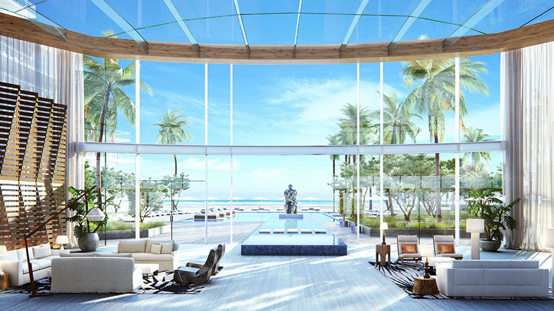 Auberge Beach Residences, Fort Lauderdale luxury and ultra luxury condos grand lobby with soaring glass, a reflecting pool, sculpture, palm trees, and an ocean view beyond.