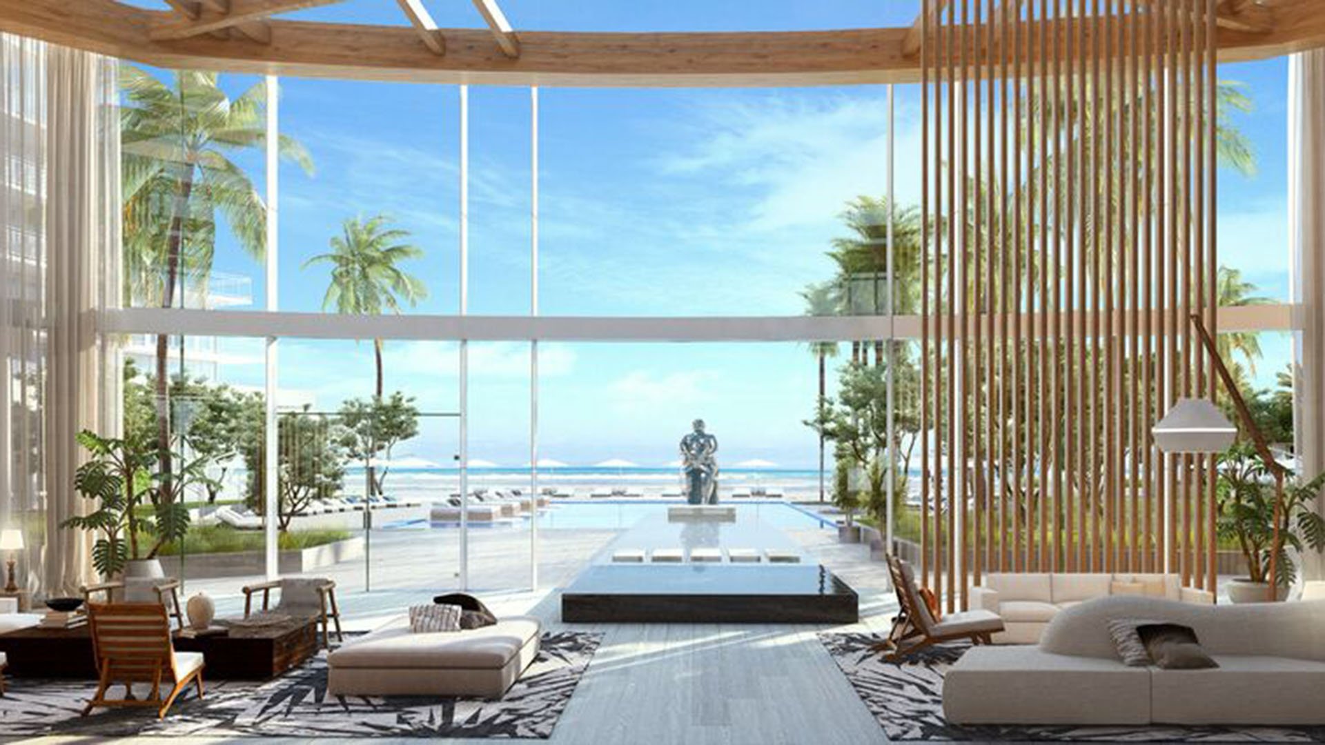 Auberge Beach Residences, Fort Lauderdale luxury and ultra luxury condos lobby lounge with a wood screen, reflecting pool, sculpture, and a direct visual connection to the ocean.