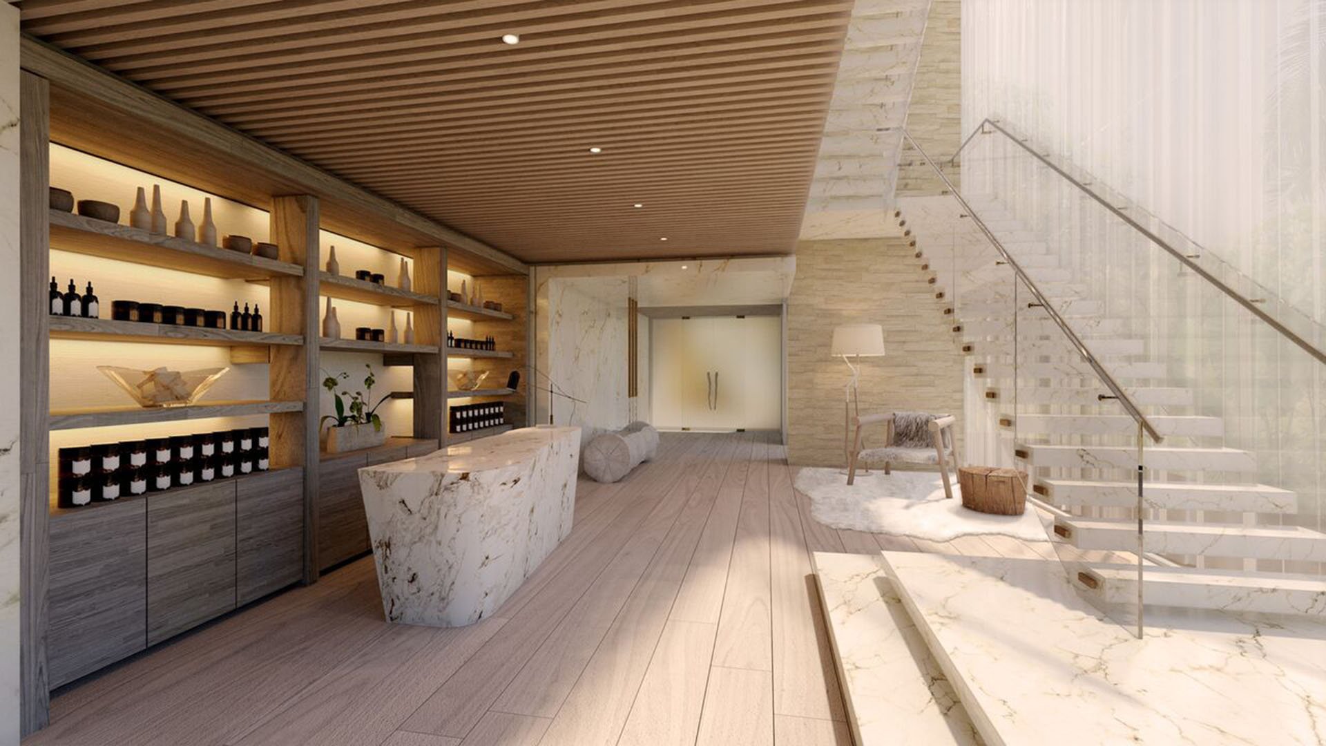 Auberge Beach Residences, Fort Lauderdale luxury and ultra luxury condos spa reception lounge with a marble desk, floating staircase, warm shelving, and serene natural finishes.