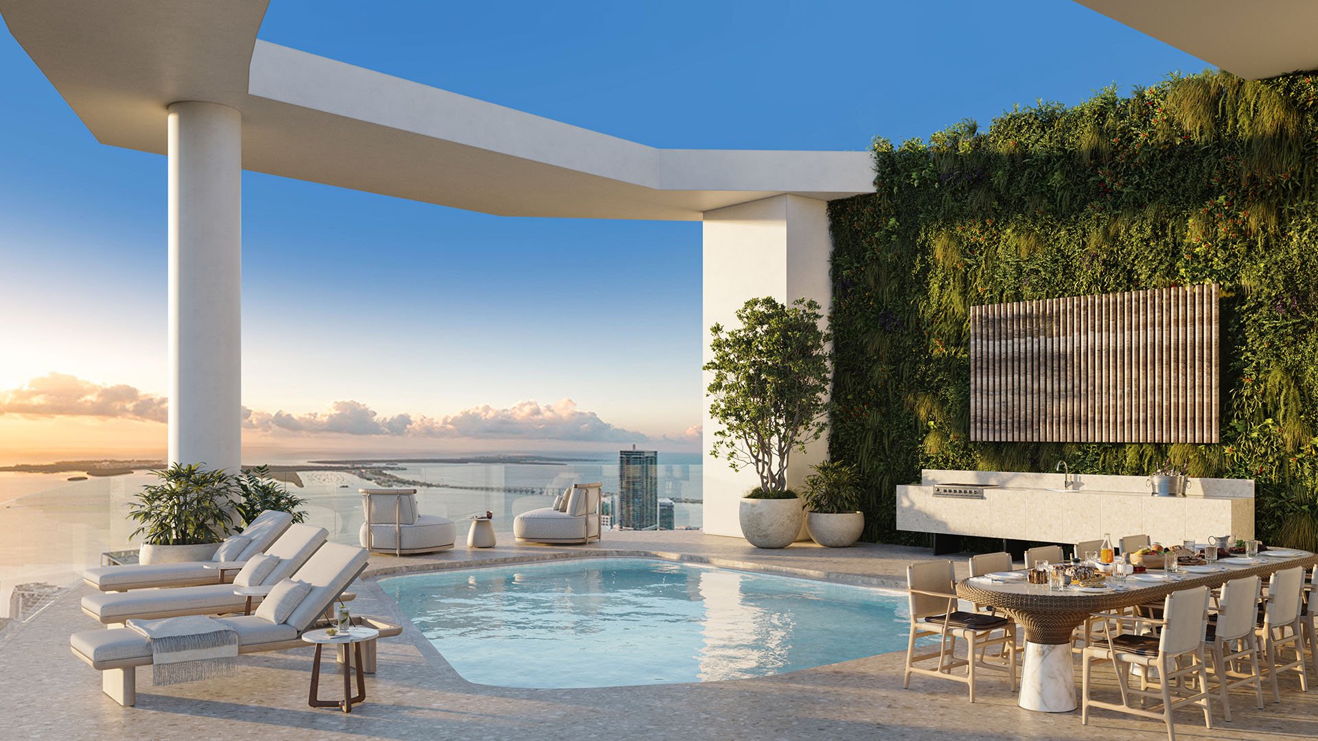 Baccarat Residences in Brickell, Miami, luxury and ultra luxury condos featuring a penthouse pool terrace, outdoor dining, a green wall, sun loungers, and panoramic bay views.