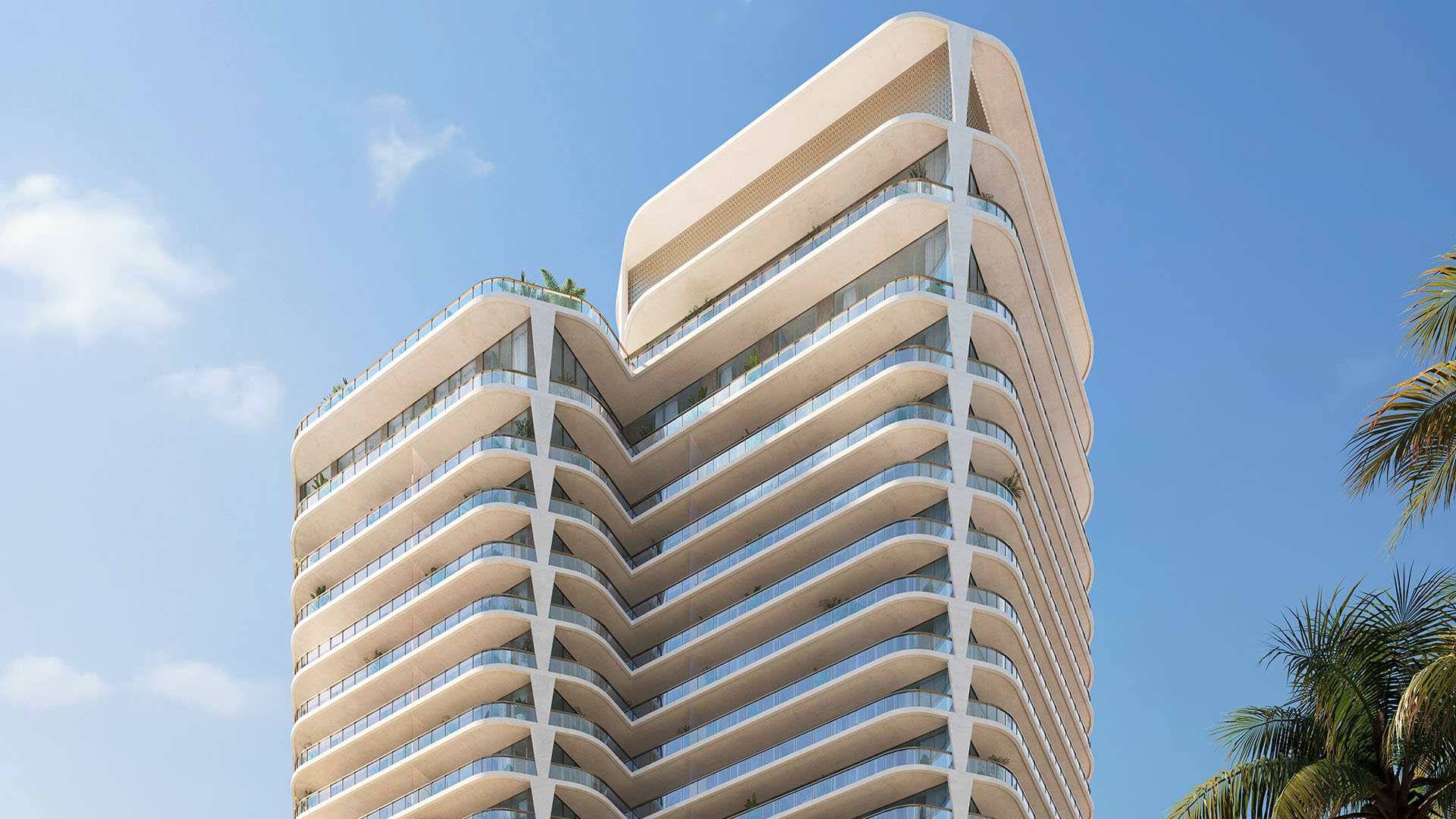 Curved corner exterior with layered balconies rising against a blue sky at Banyan Tree Residences in West Palm Beach, presenting luxury and ultra luxury condos with a sculptural modern waterfront tower design.