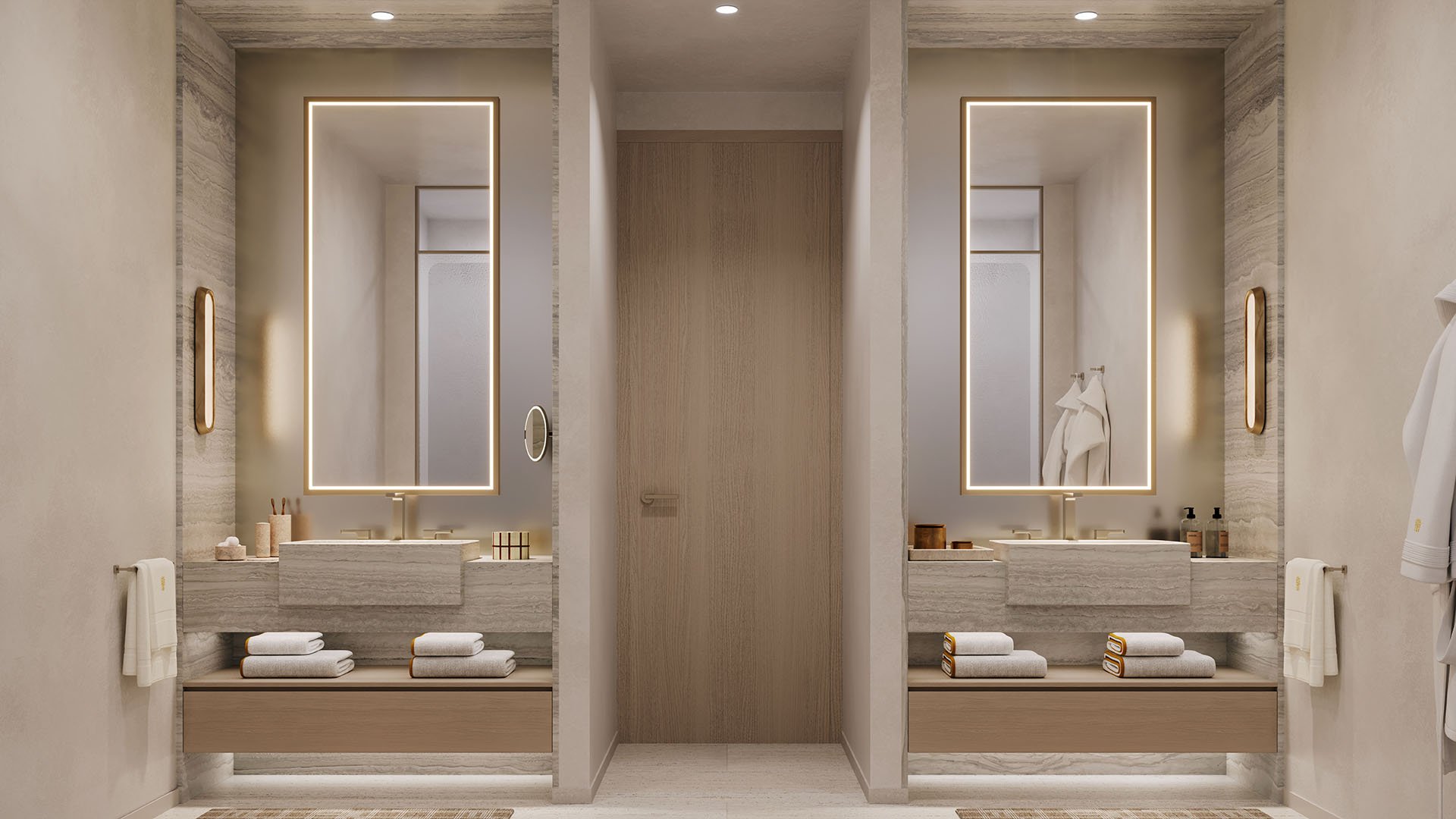 Symmetrical double vanity bathroom with tall backlit mirrors at Banyan Tree Residences in West Palm Beach, reflecting the luxury and ultra luxury condos through warm wood tones, stone surfaces, and refined spa-inspired detailing.