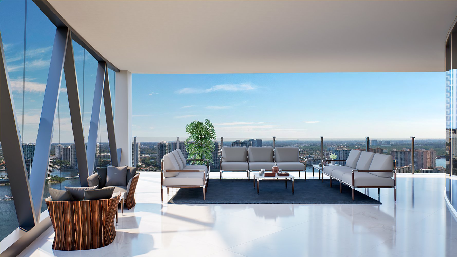 Bentley Residences Sunny Isles balcony lounge with city view in Sunny Isles Beach; luxury and ultra luxury condos, preconstruction, outdoor living.