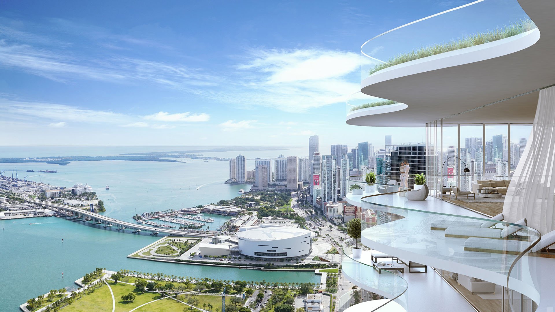 Casa Bella Downtown Miami wraparound glass balcony overlooking Biscayne Bay, downtown skyline and waterfront parks, featuring luxury and ultra luxury preconstruction condos with signature curved architecture.
