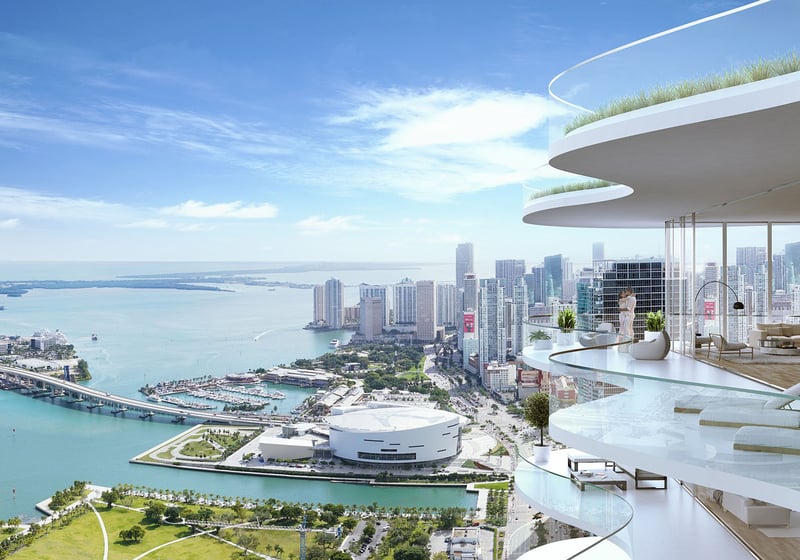 Casa Bella Downtown Miami wraparound glass balcony overlooking Biscayne Bay, downtown skyline and waterfront parks, featuring luxury and ultra luxury preconstruction condos with signature curved architecture.