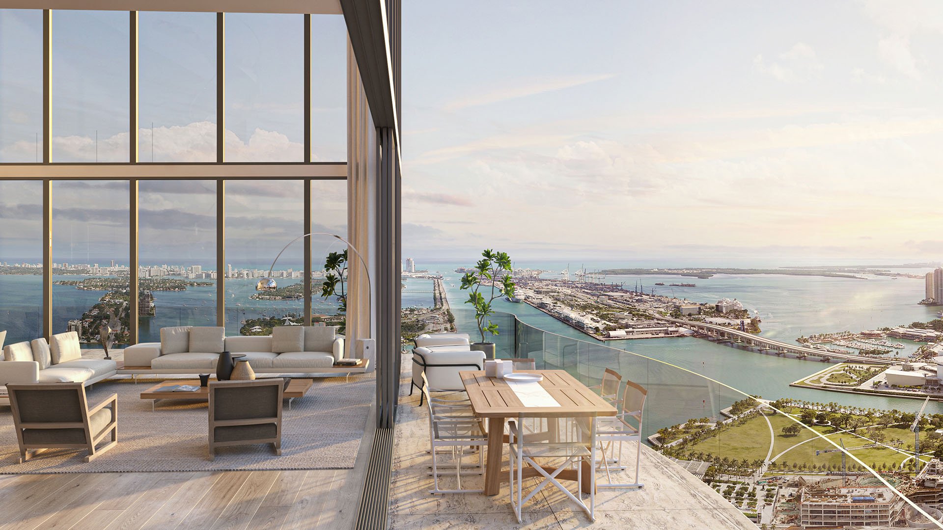 Casa Bella Downtown Miami luxury condo living room with soaring windows and balcony dining overlooking Biscayne Bay and PortMiami, showcasing ultra luxury preconstruction condos with iconic architecture.