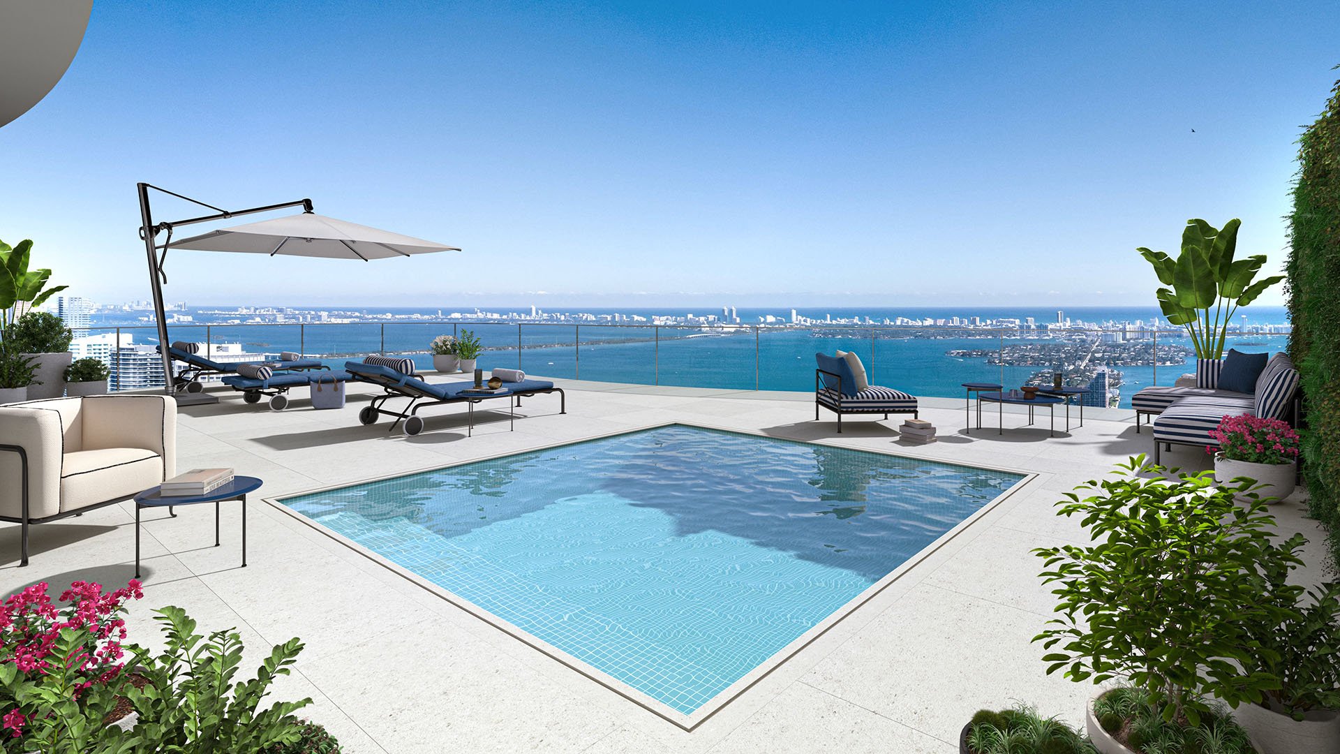 Casa Bella Downtown Miami rooftop plunge pool and sun terrace overlooking Biscayne Bay and the Miami skyline, highlighting luxury and ultra luxury preconstruction condos with private-style outdoor amenities.