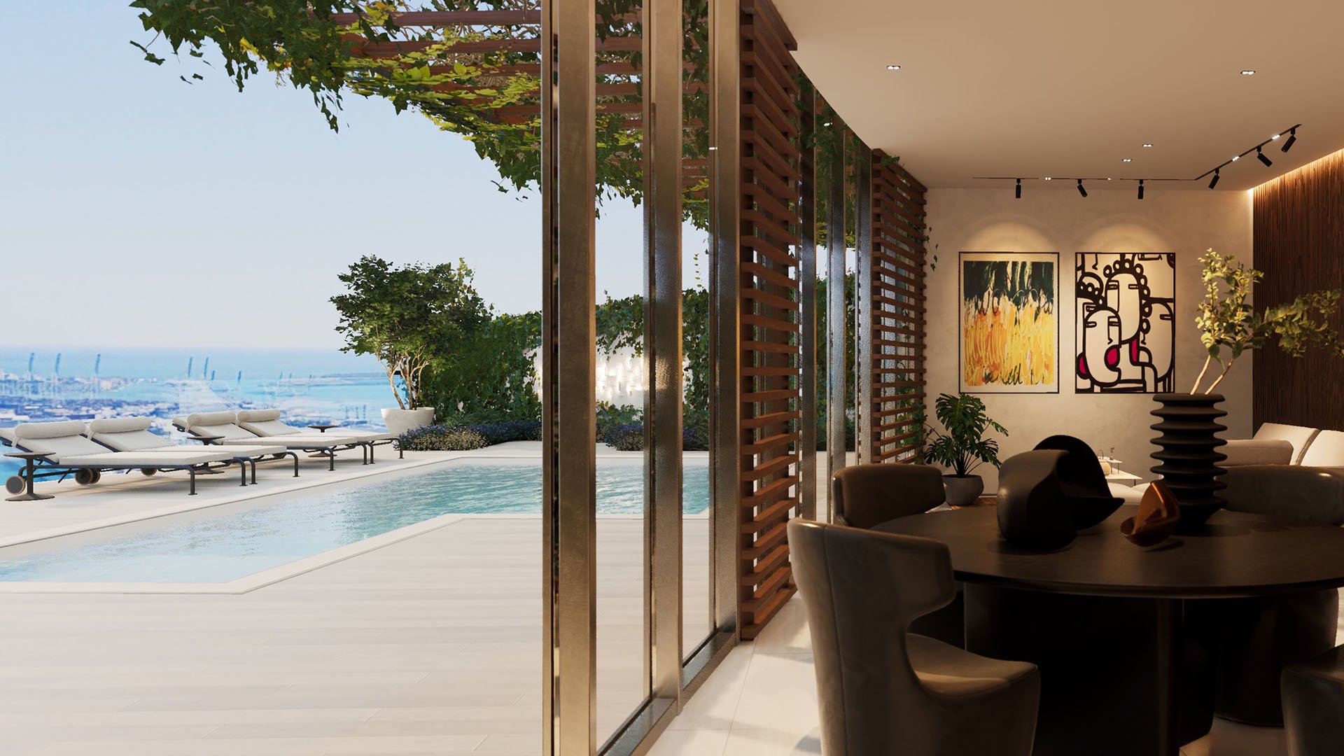 Casa Bella Downtown Miami resort-style pool deck with sun loungers and indoor-outdoor lounge overlooking Biscayne Bay, highlighting luxury and ultra luxury preconstruction condos amenities.