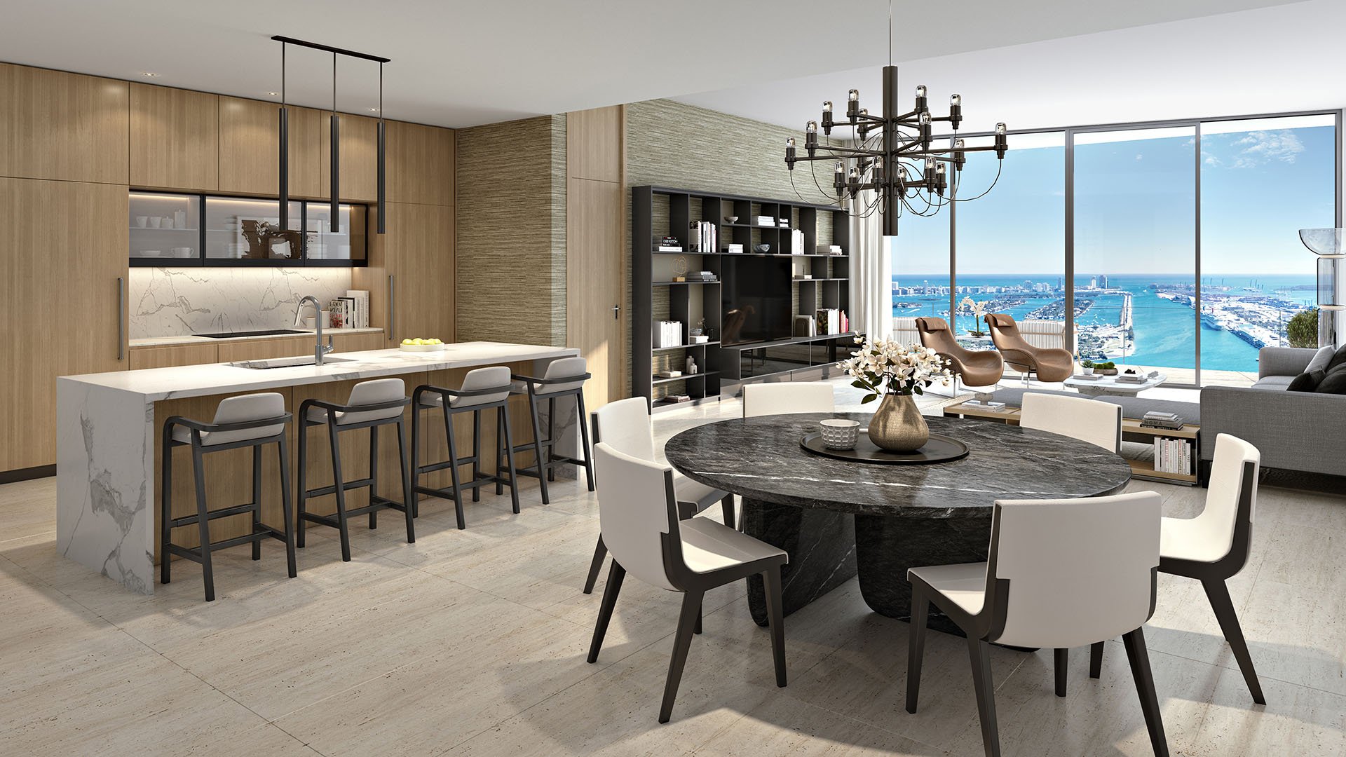 Casa Bella Downtown Miami open-concept kitchen, dining and living space with Biscayne Bay views, designer finishes and bar seating, representing luxury and ultra luxury preconstruction condos in Downtown Miami.