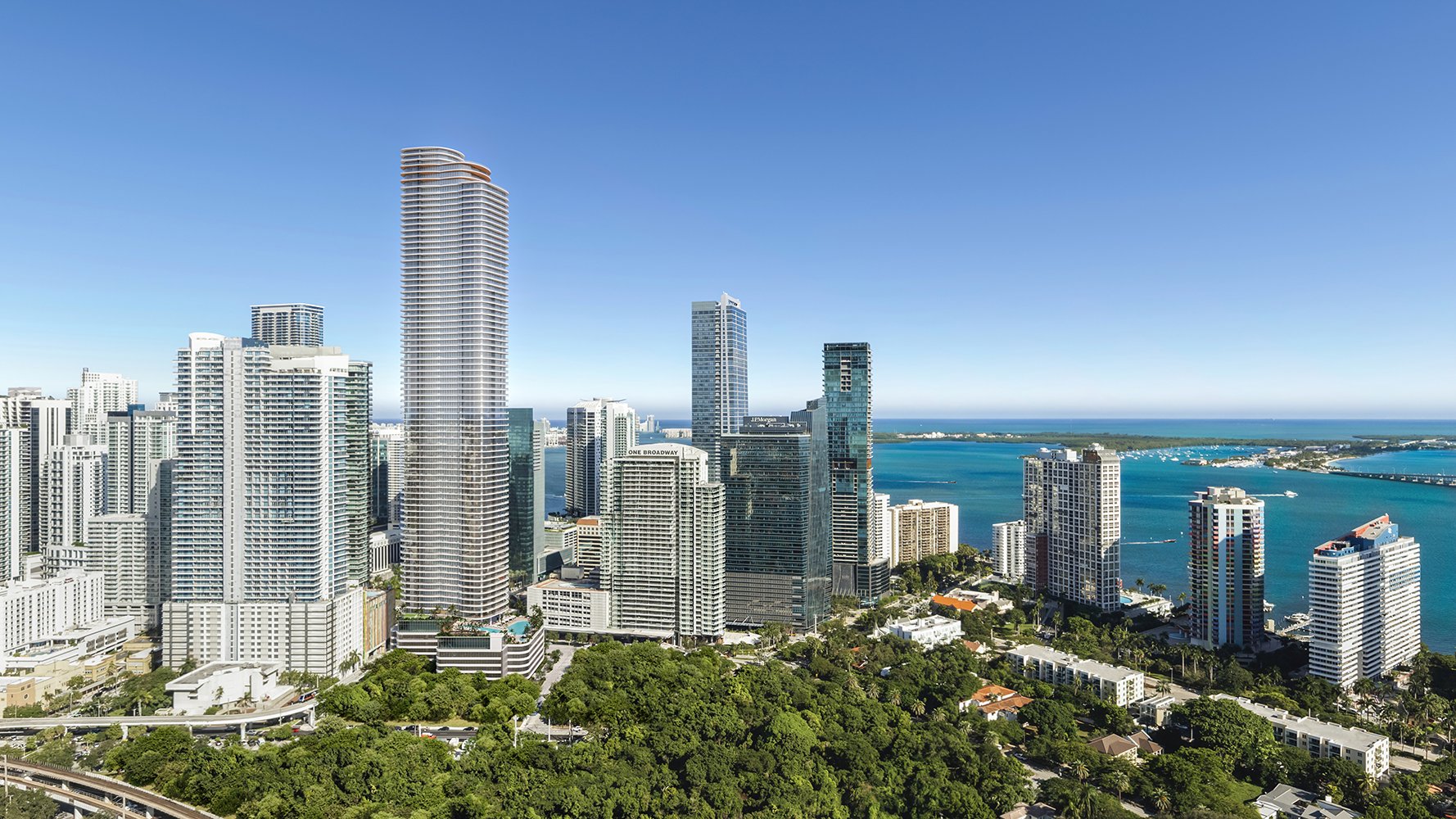 Cipriani Residences Brickell over Biscayne Bay; luxury waterfront tower for ultra luxury preconstruction condos in Brickell, Miami. Featuring skyline and water.
