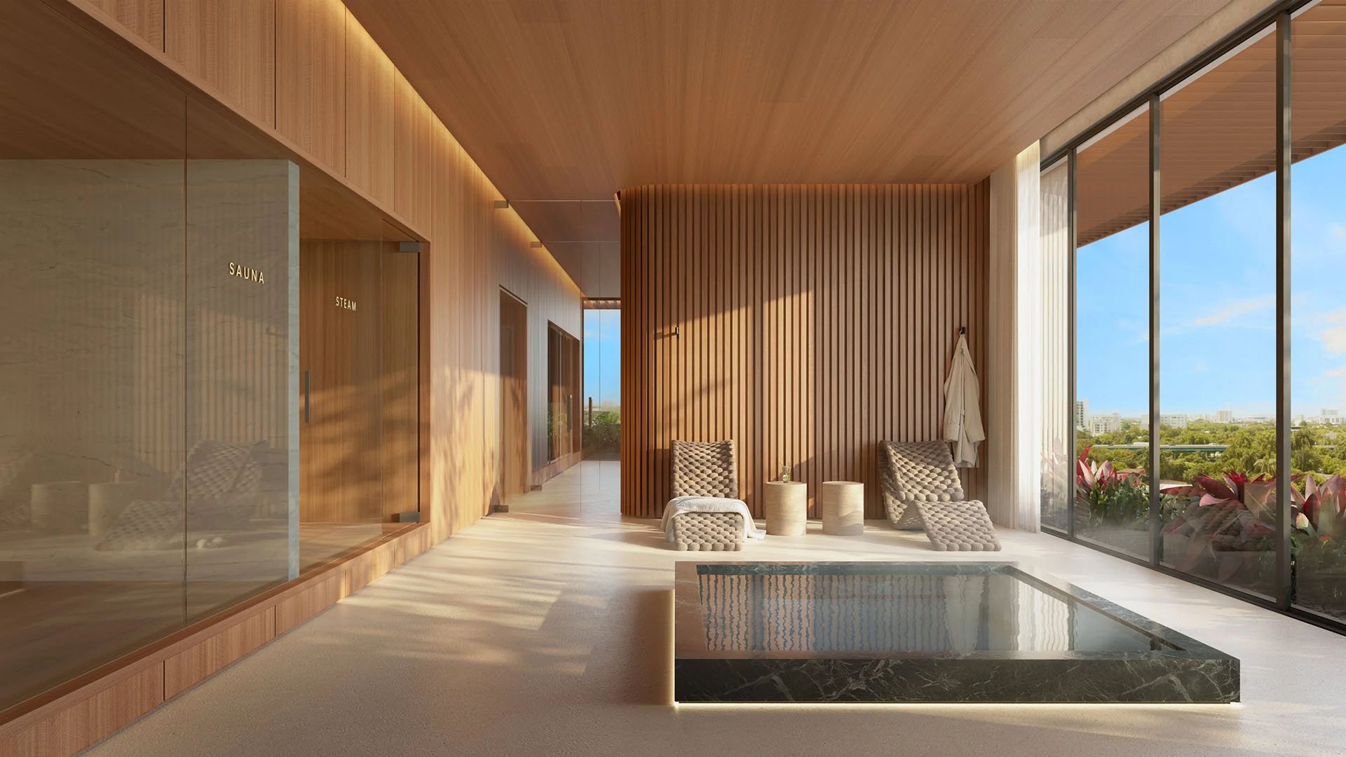 Colette Residences in Brickell luxury ultra luxury condos with a spa amenity featuring sauna and steam rooms, a plunge pool, lounge chairs, and tall windows.